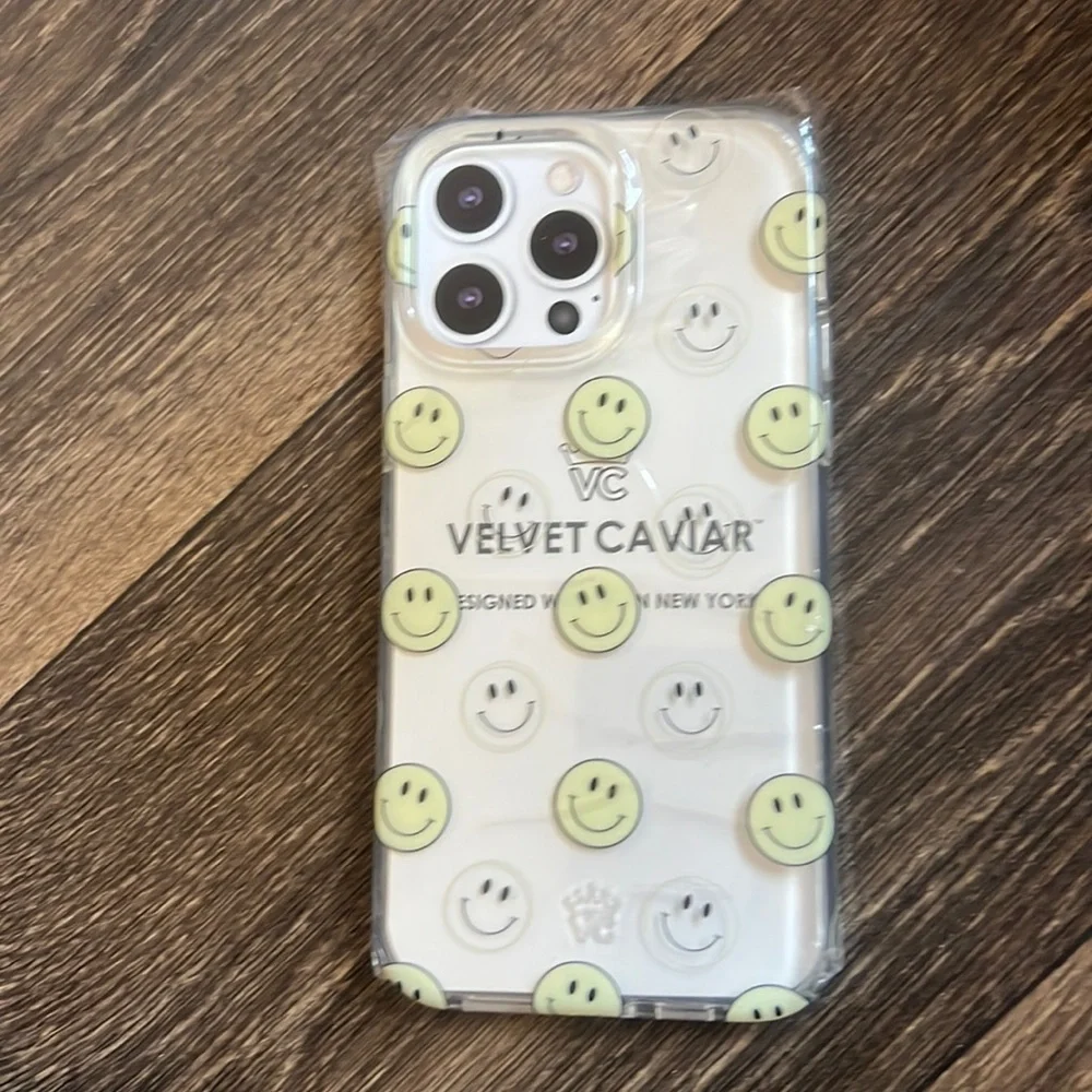 Velvet caviar happy face phone case